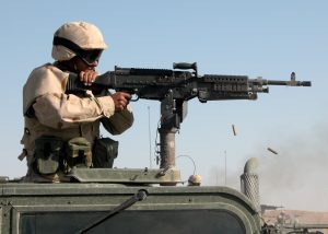 040410-N-1261P-011 
Iraq (Apr. 10, 2004) - Utilitiesman 3rd Class Eduardo Riveragonzalez assigned to Naval Mobile Construction Battalion Seventy Four (NMCB-74), fires a 7.62mm caliber M240B machine gun down range during weapons qualifications. NMCB-74 is currently on deployment in Central Iraq in support of Operation Iraqi Freedom (OIF). U.S. Navy photo by Photographer's Mate 2nd Class Eric Powell (RELEASED)